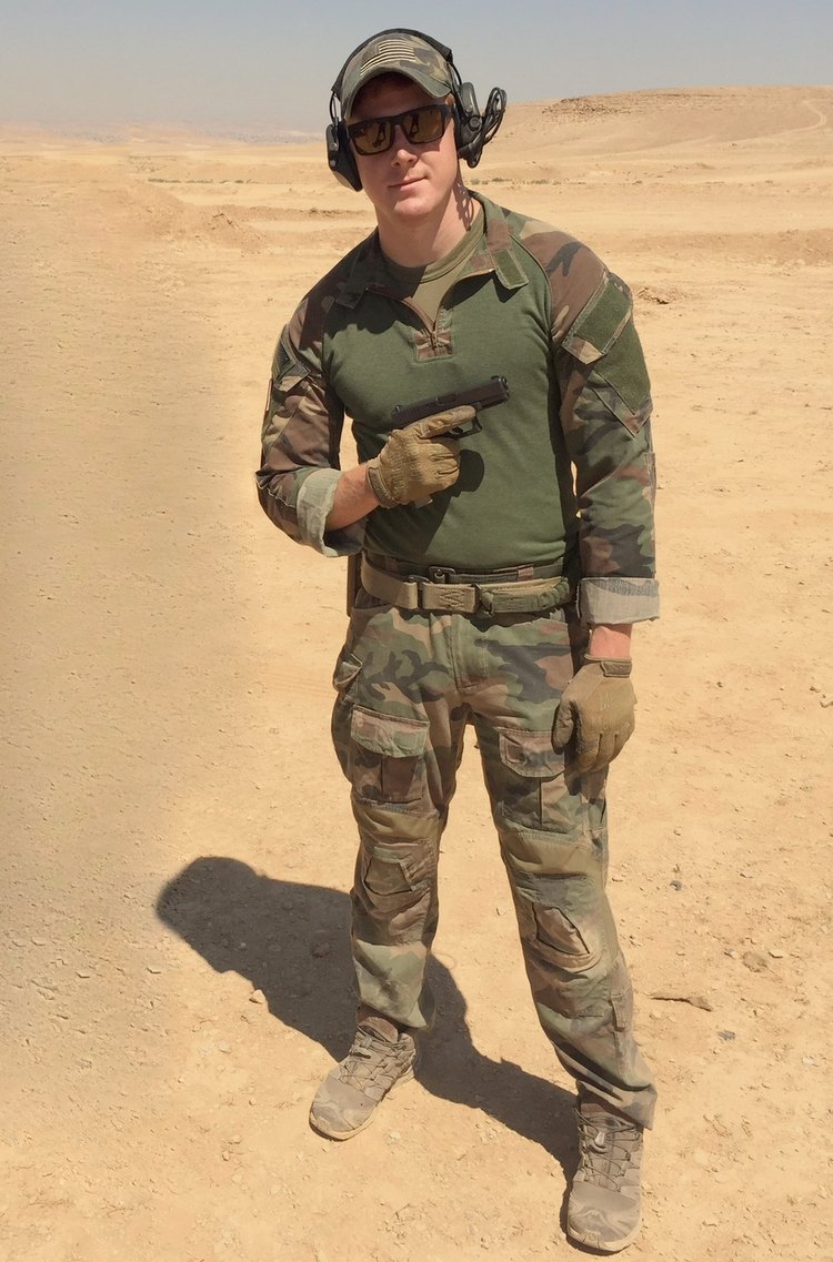 Sergeant Ryan Gunning, U.S. Marine Corps veteran, during pistol range training